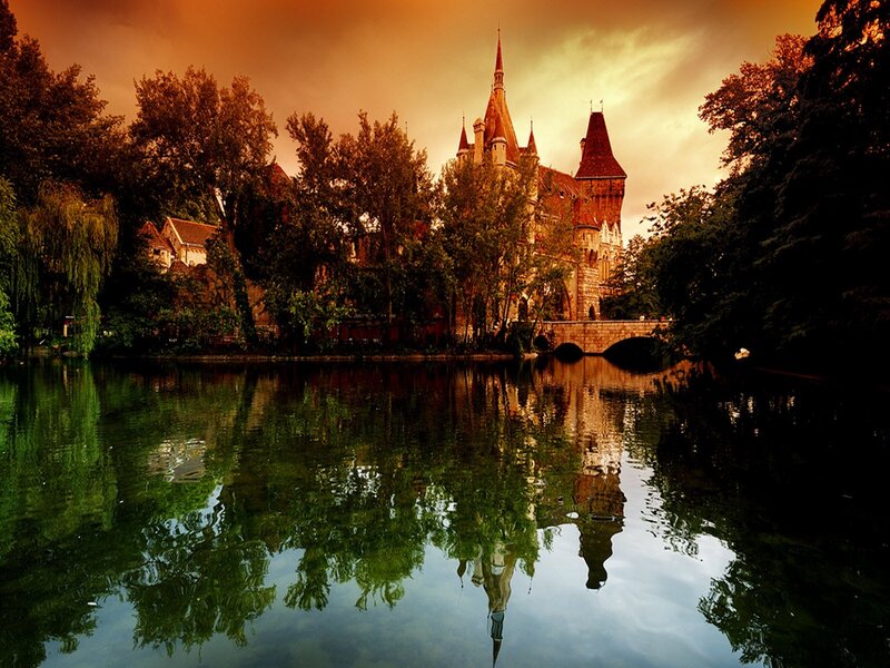 Castle by the lake at sunset