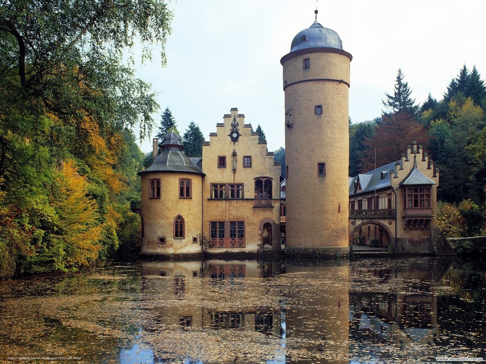 Castle by the lake in autumn
