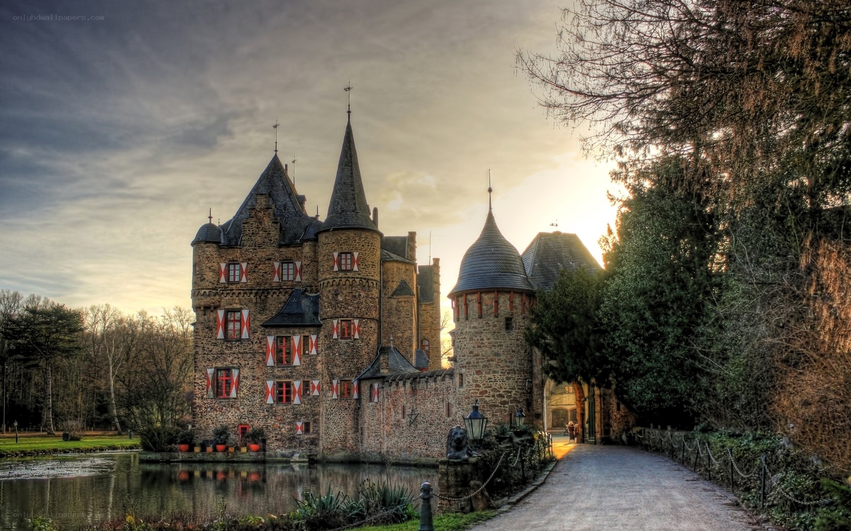 Castle by the moat at sunset