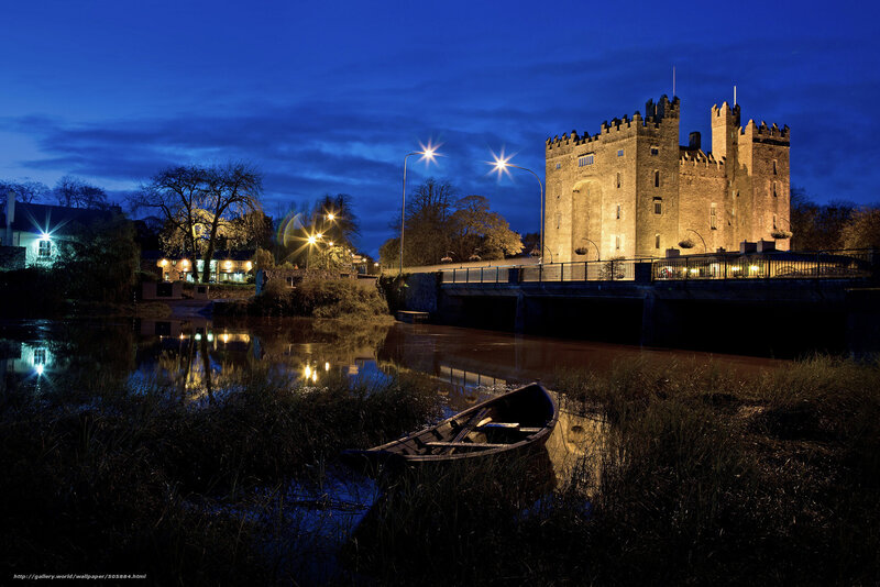 Castle by the river at night