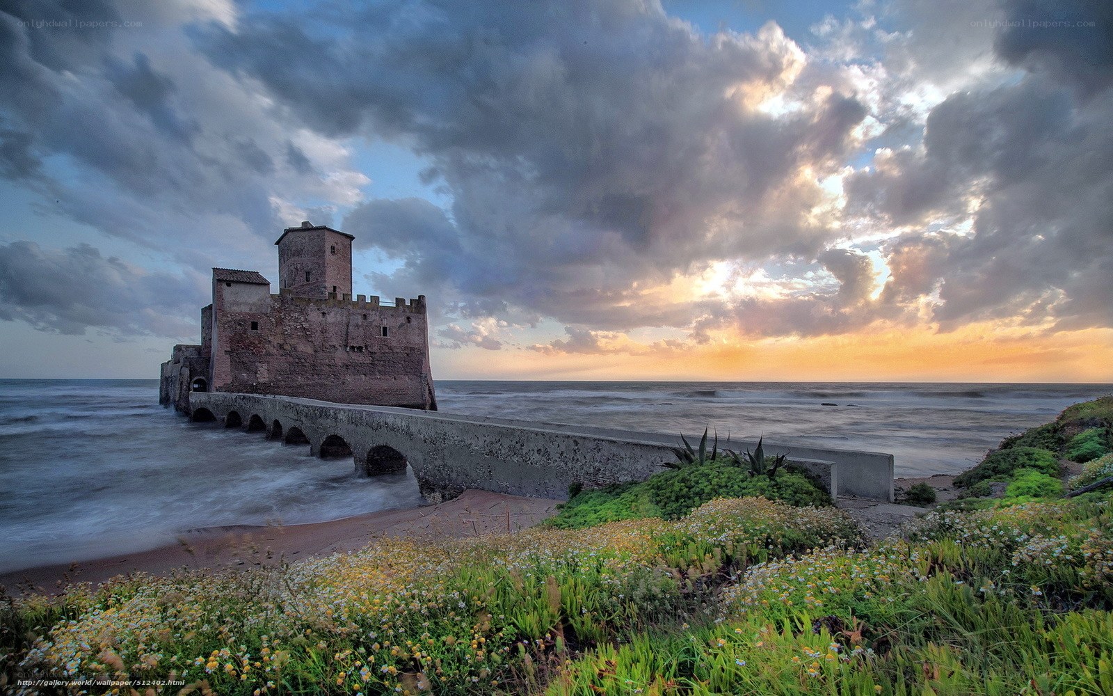 Castle by the sea at sunset