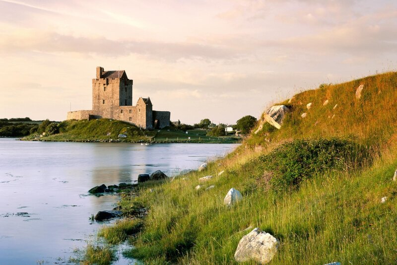 Castle by the water at sunset