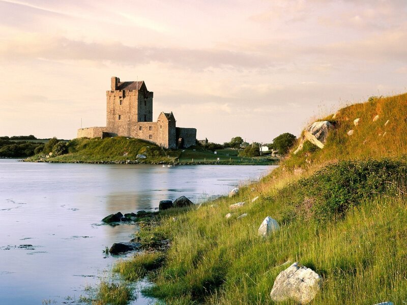 Castle by the water at sunset