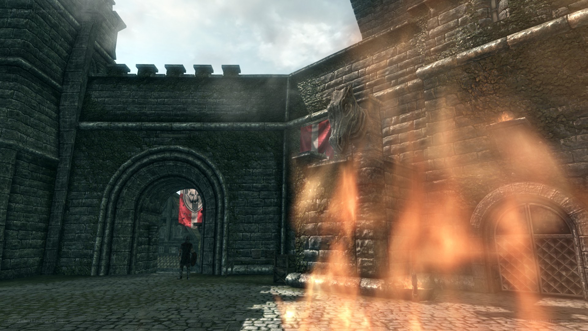 castle courtyard with fire