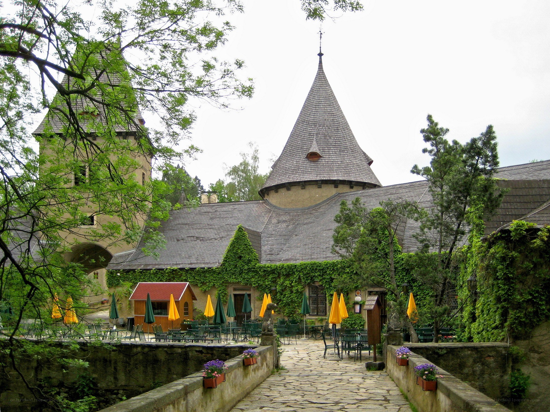 castle courtyard with outdoor seating