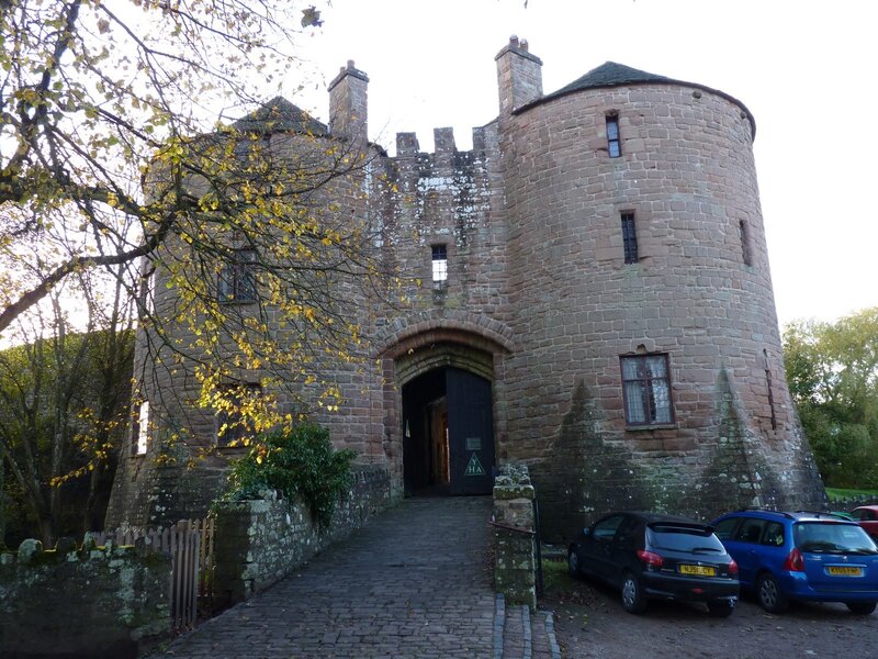 castle entrance with parked cars