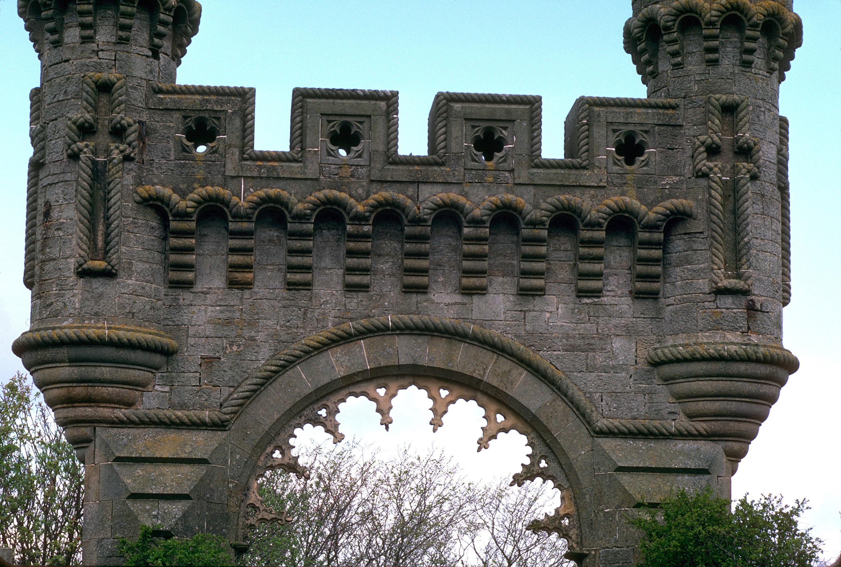 castle gate with ornate stonework