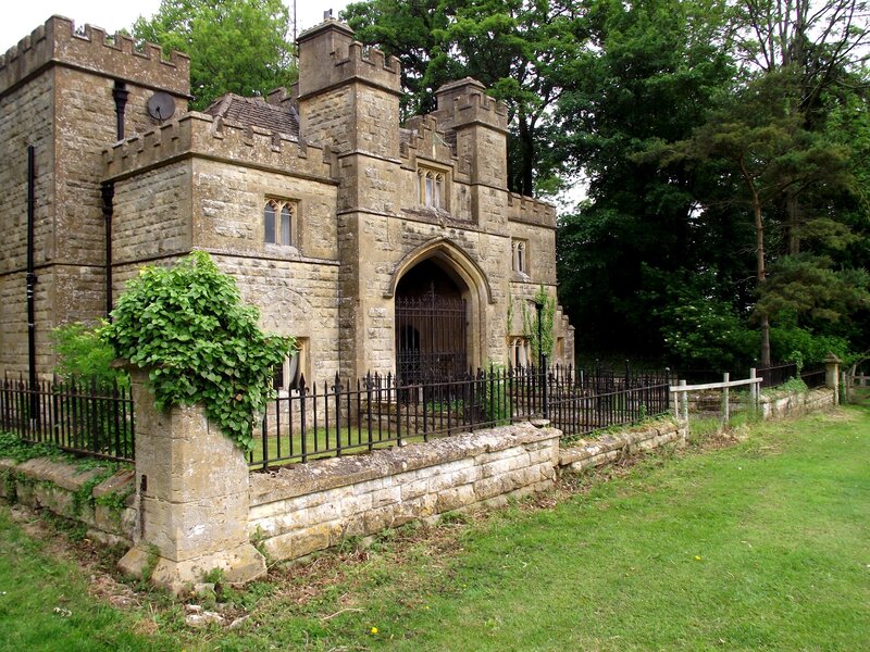 castle gatehouse with iron fence
