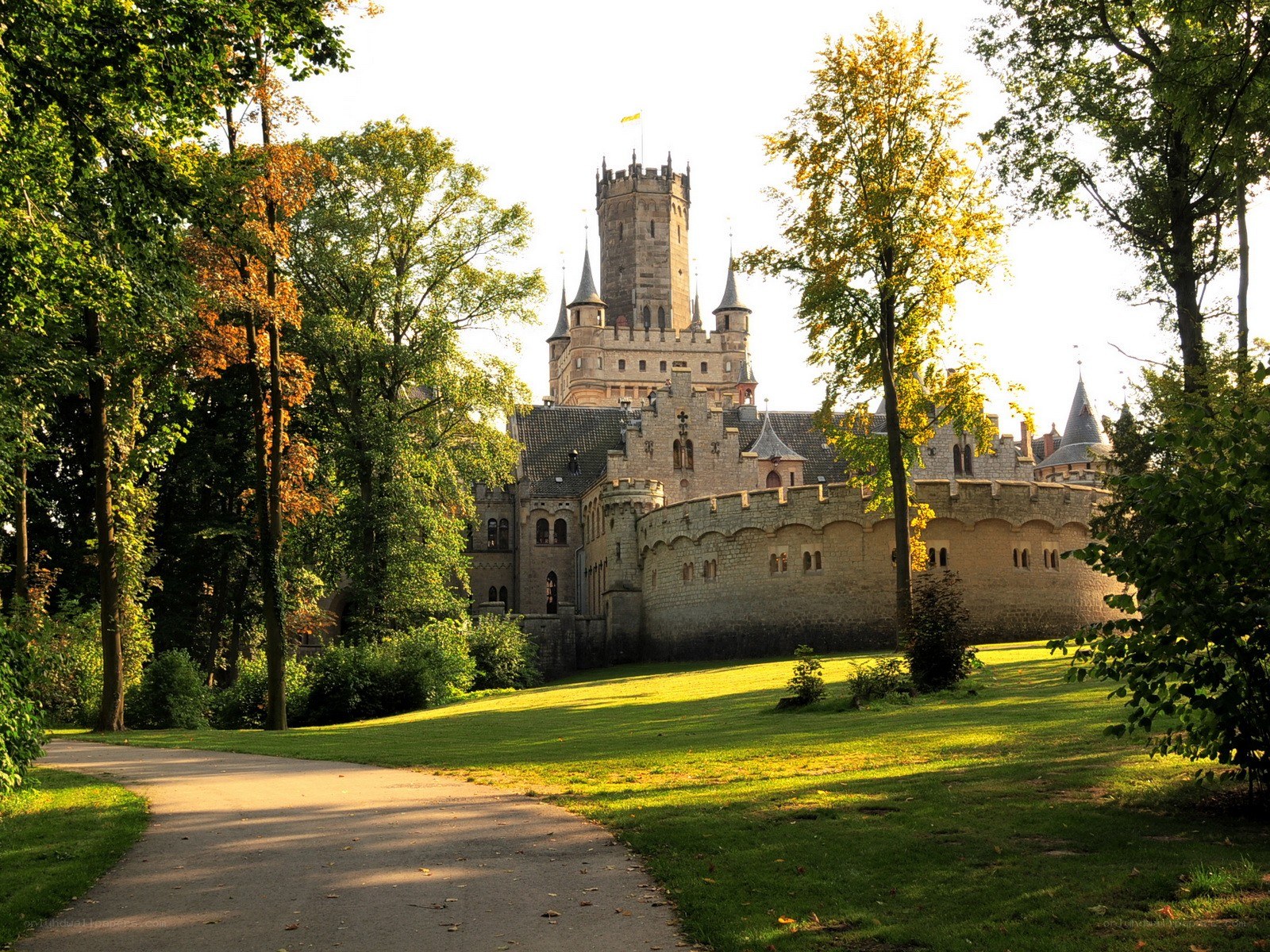 castle in a park at sunset