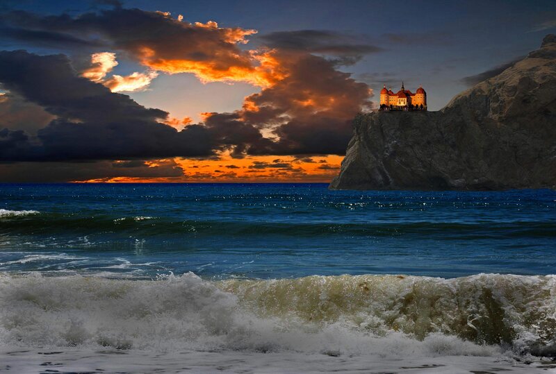Castle on a cliff at sunset