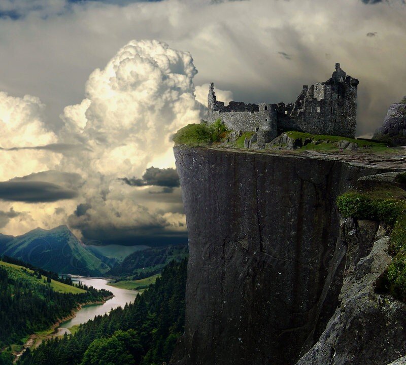 Castle on a cliff overlooking a valley