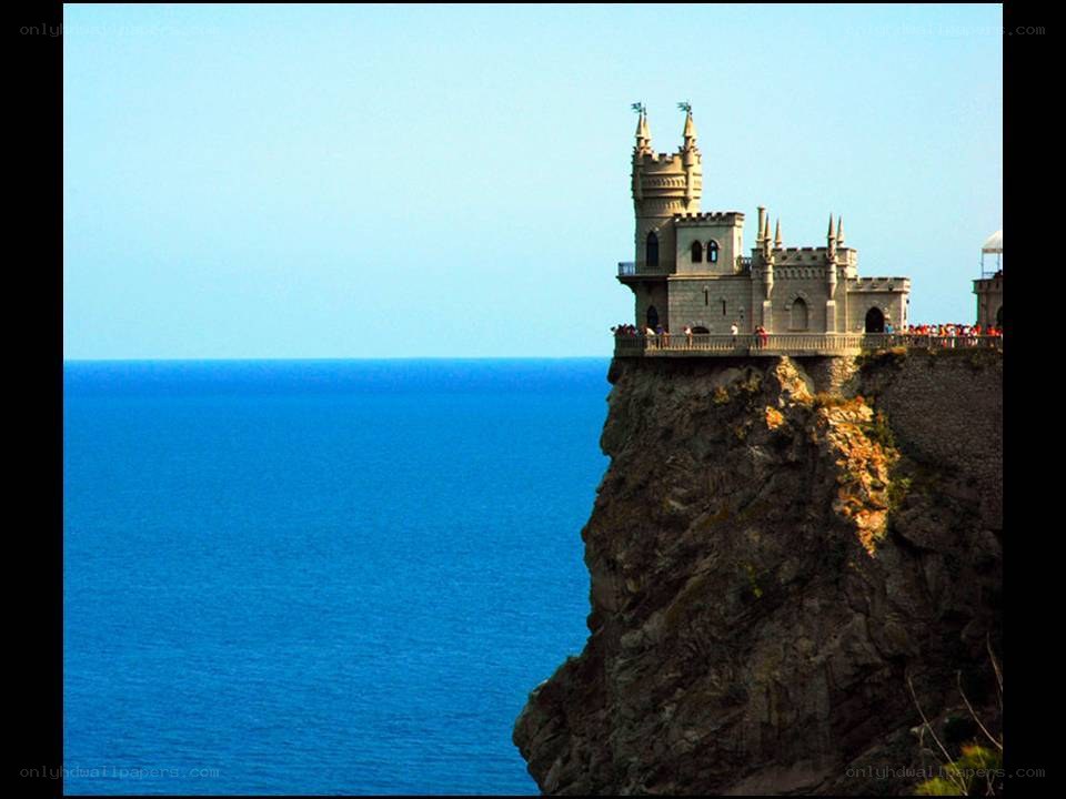 castle on a cliff overlooking the sea