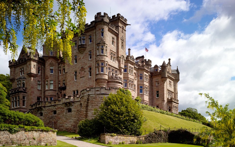 castle on a grassy hill