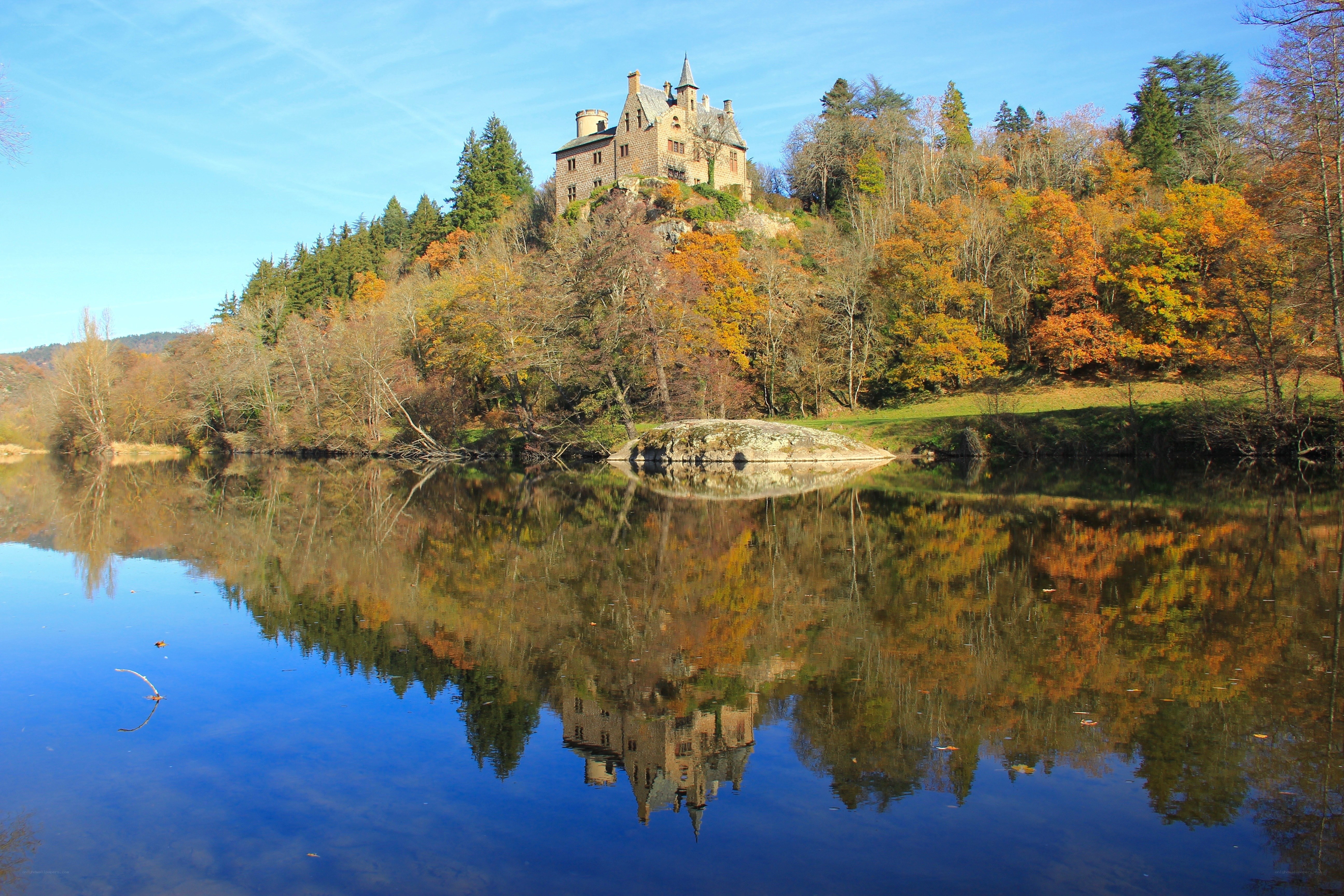 Castle on a hill by the lake