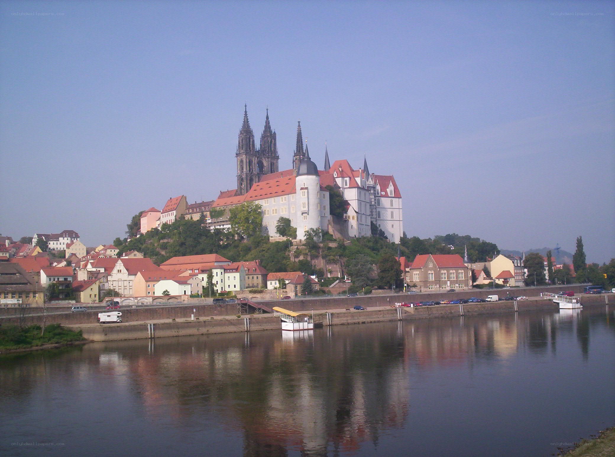 Castle on a hill by the river
