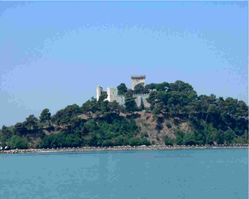 castle on a hill by the sea