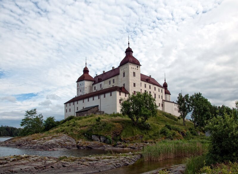 castle on a hill by the water