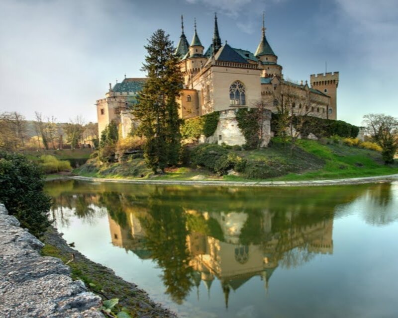 Castle on a Hill — Green, Serene, Afternoon, Photograph, Lake