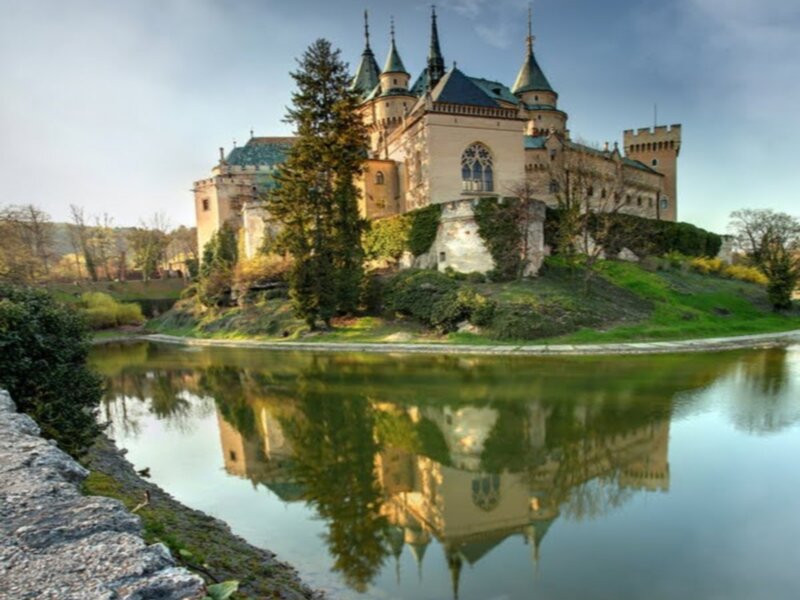 Castle on a Hill — Green, Serene, Afternoon, Photograph, Lake, Trees