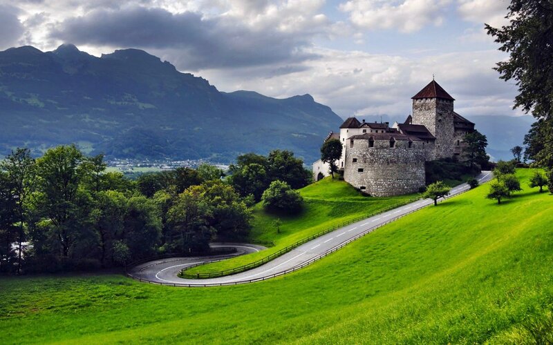 Castle on a Hill — Green, Serene, Afternoon, Photograph, Mountains, Road