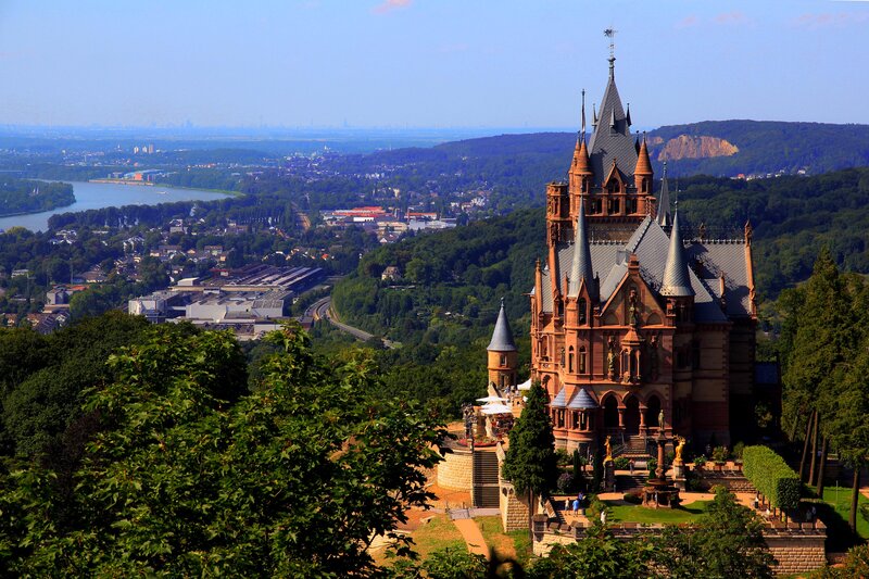 Castle on a Hill — Green, Serene, Afternoon, Photograph, River, City