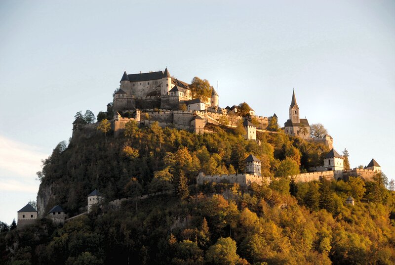 Castle on a Hill — Green, Serene, Sunset, Photograph, Trees, Church