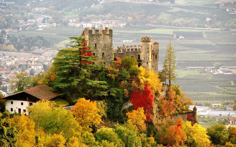 castle on a hill in autumn