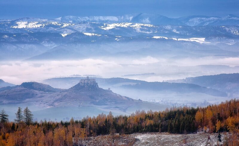 Castle on a hill in fog