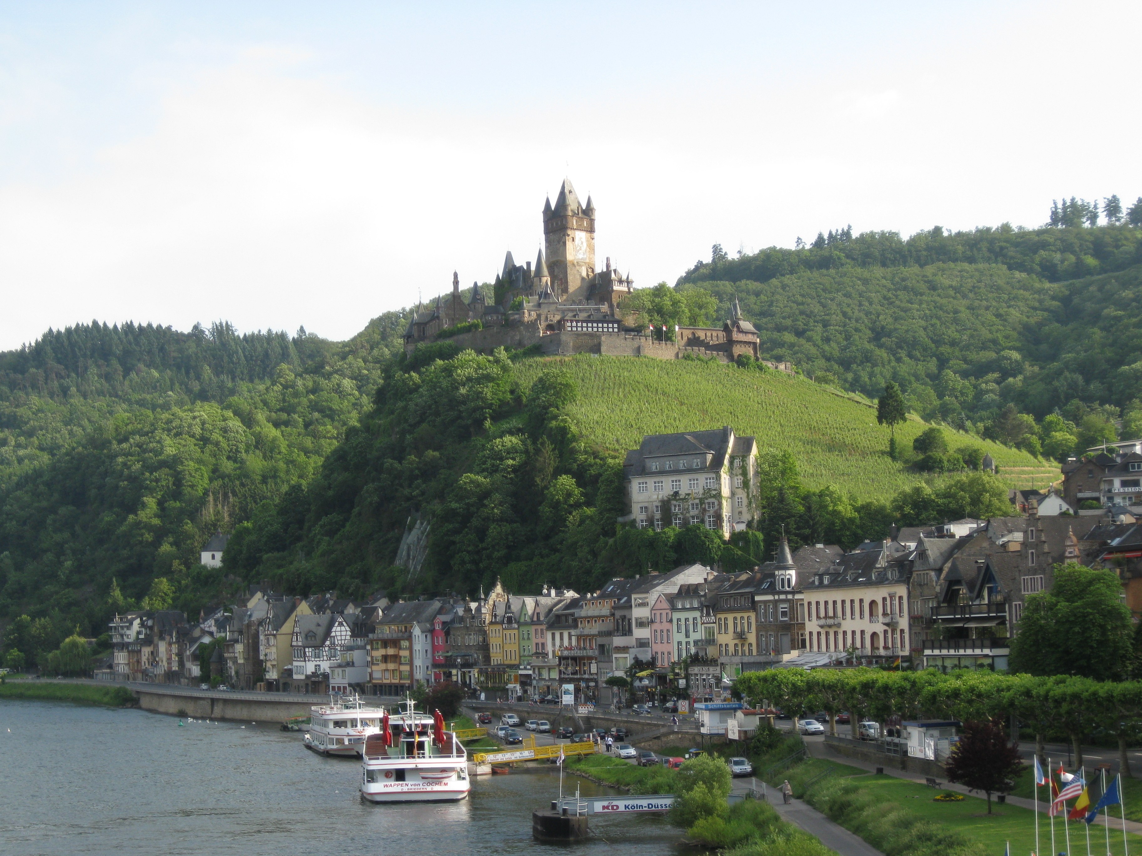 Castle on a hill overlooking a river