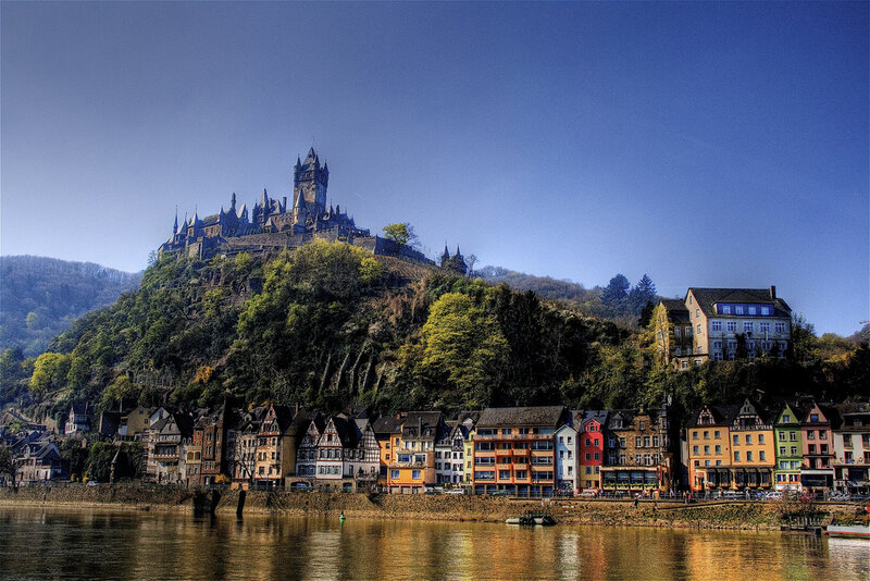 Castle on a hill overlooking a river