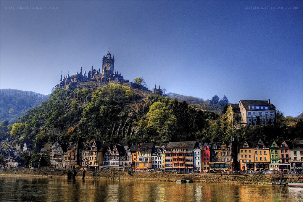 Castle on a hill overlooking a river