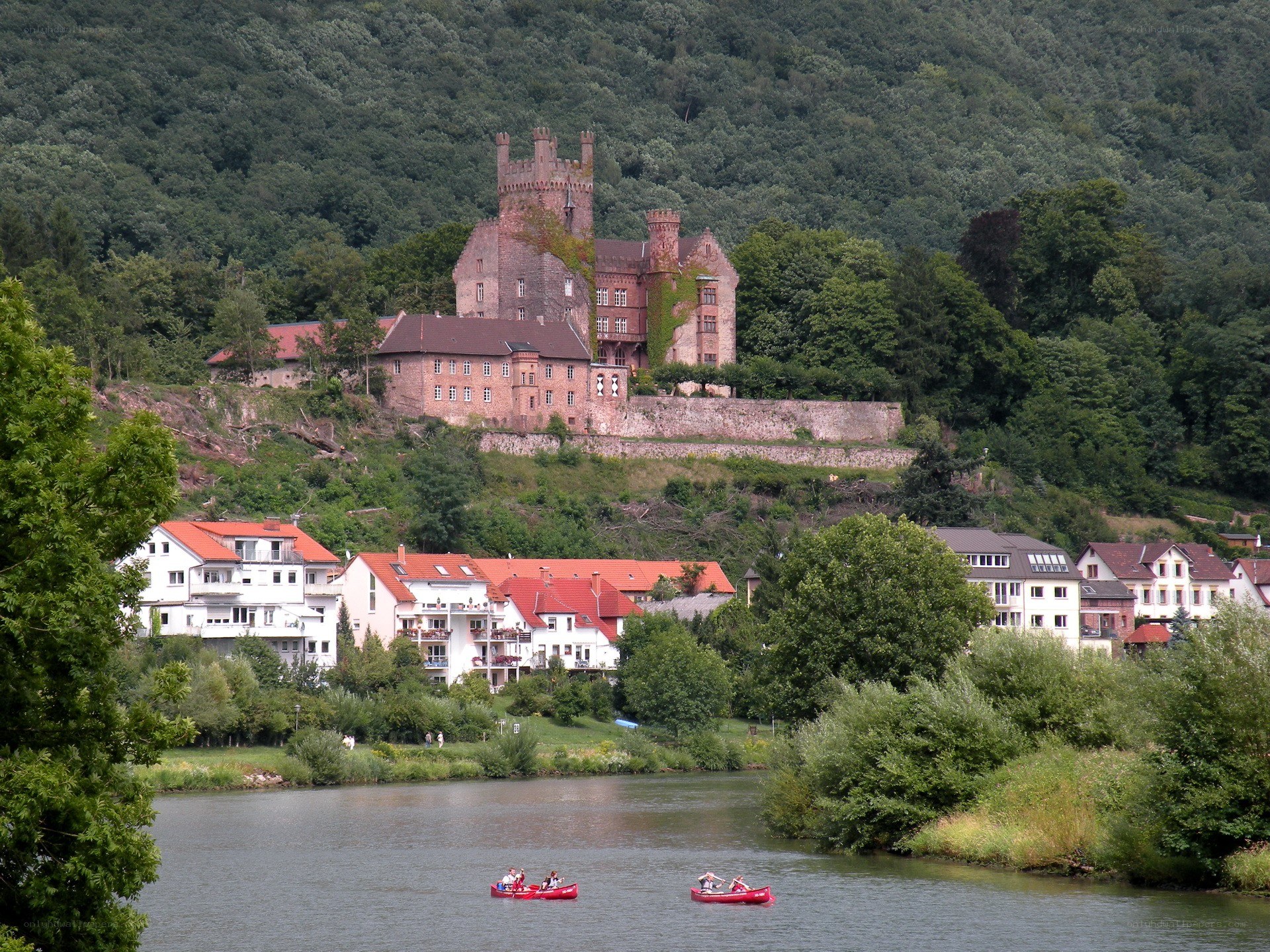 Castle on a hill overlooking a river