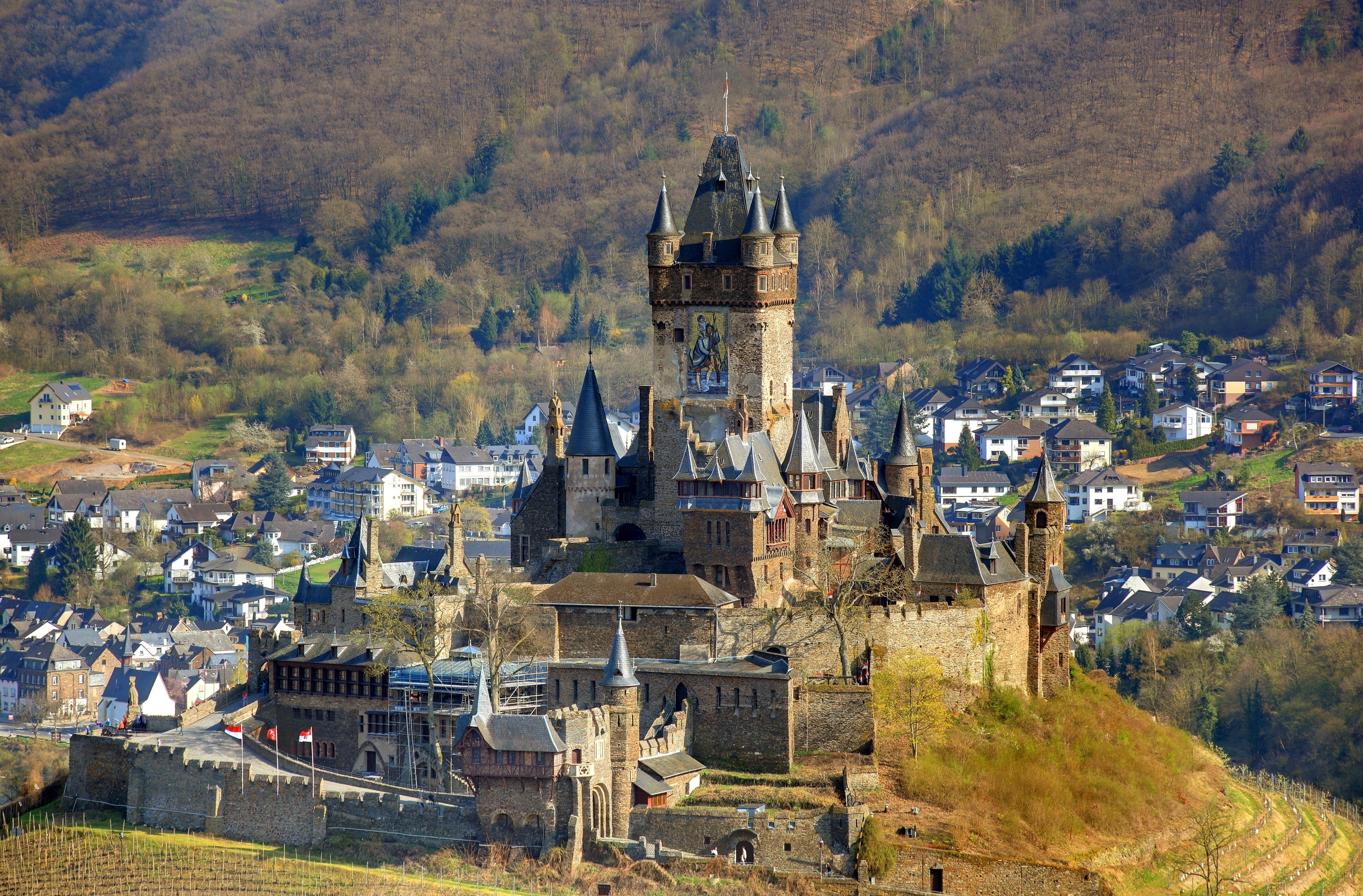 Castle on a hill overlooking a town