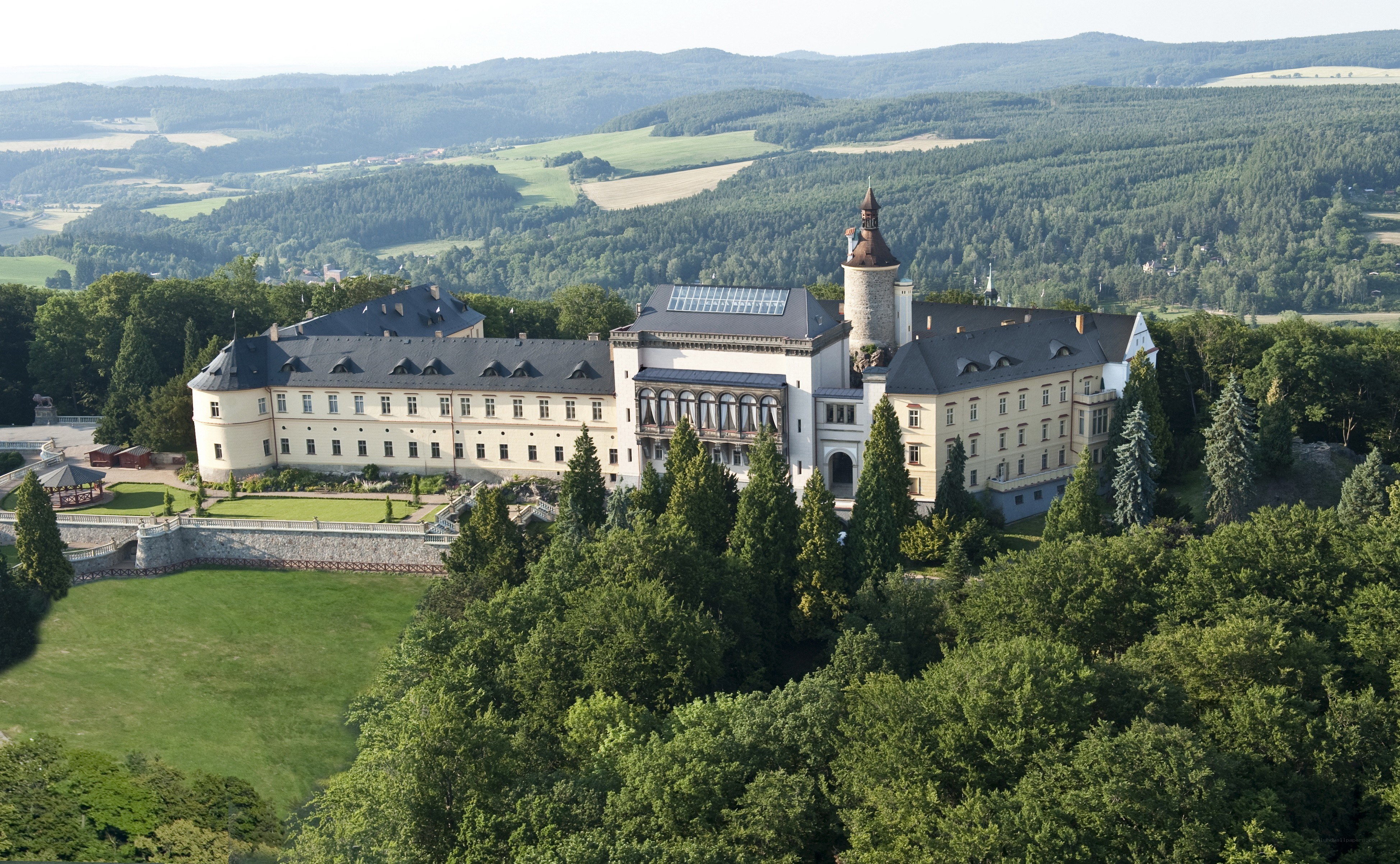 Castle on a hill with forest view