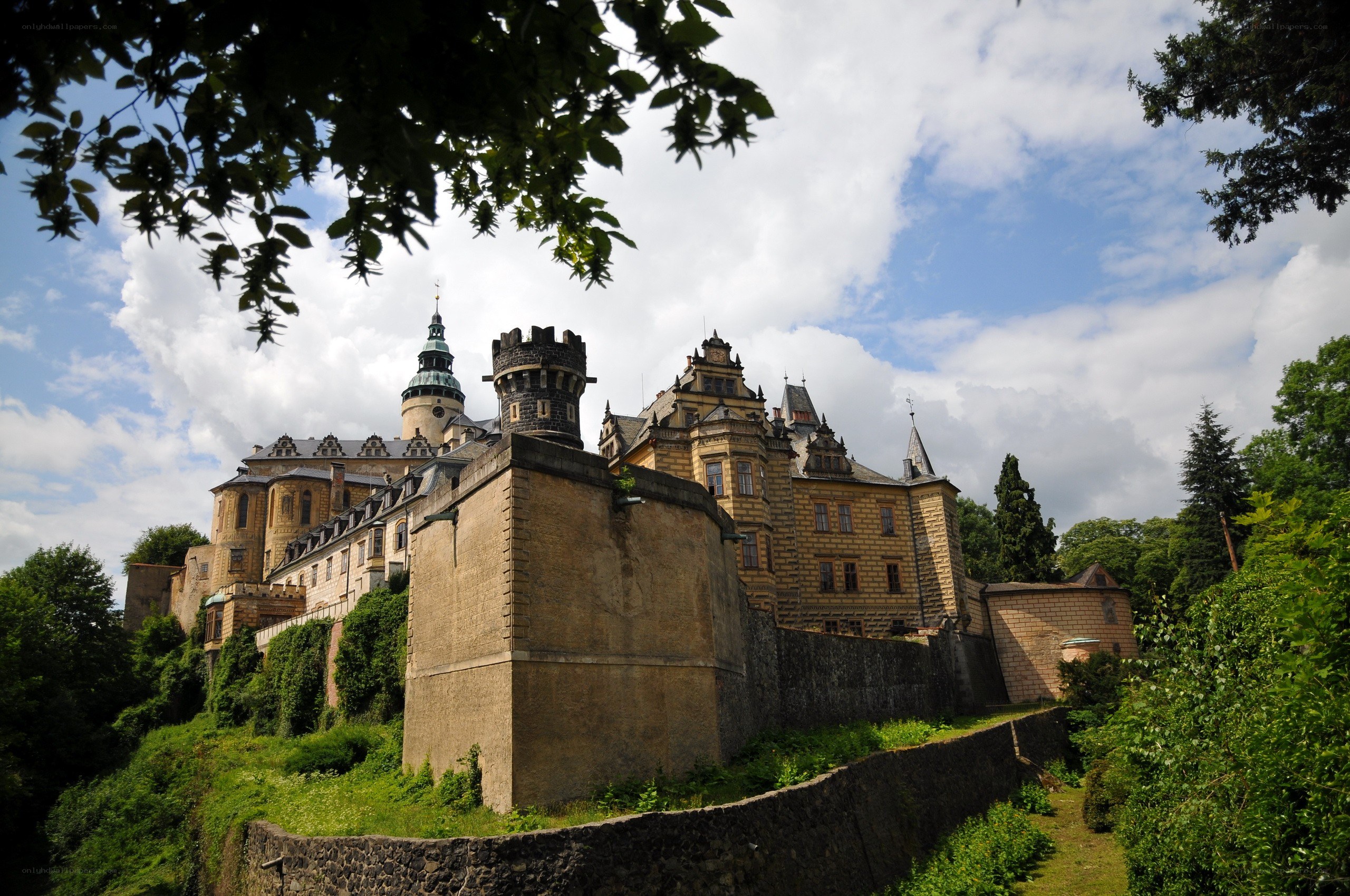 castle on a hill with greenery