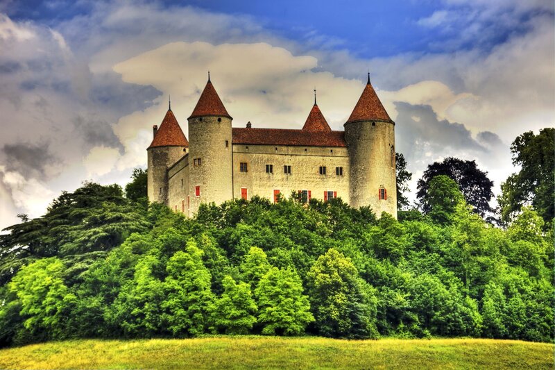 Castle on a hill with red-roofed towers