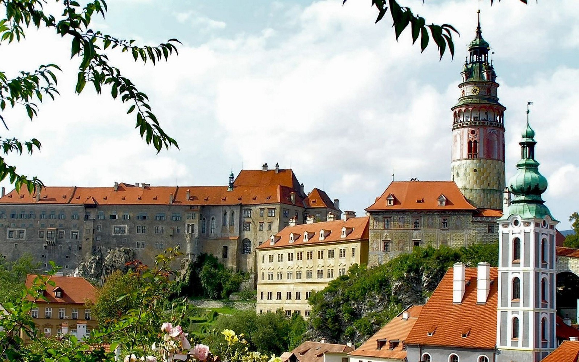 Castle on a hill with red roofs