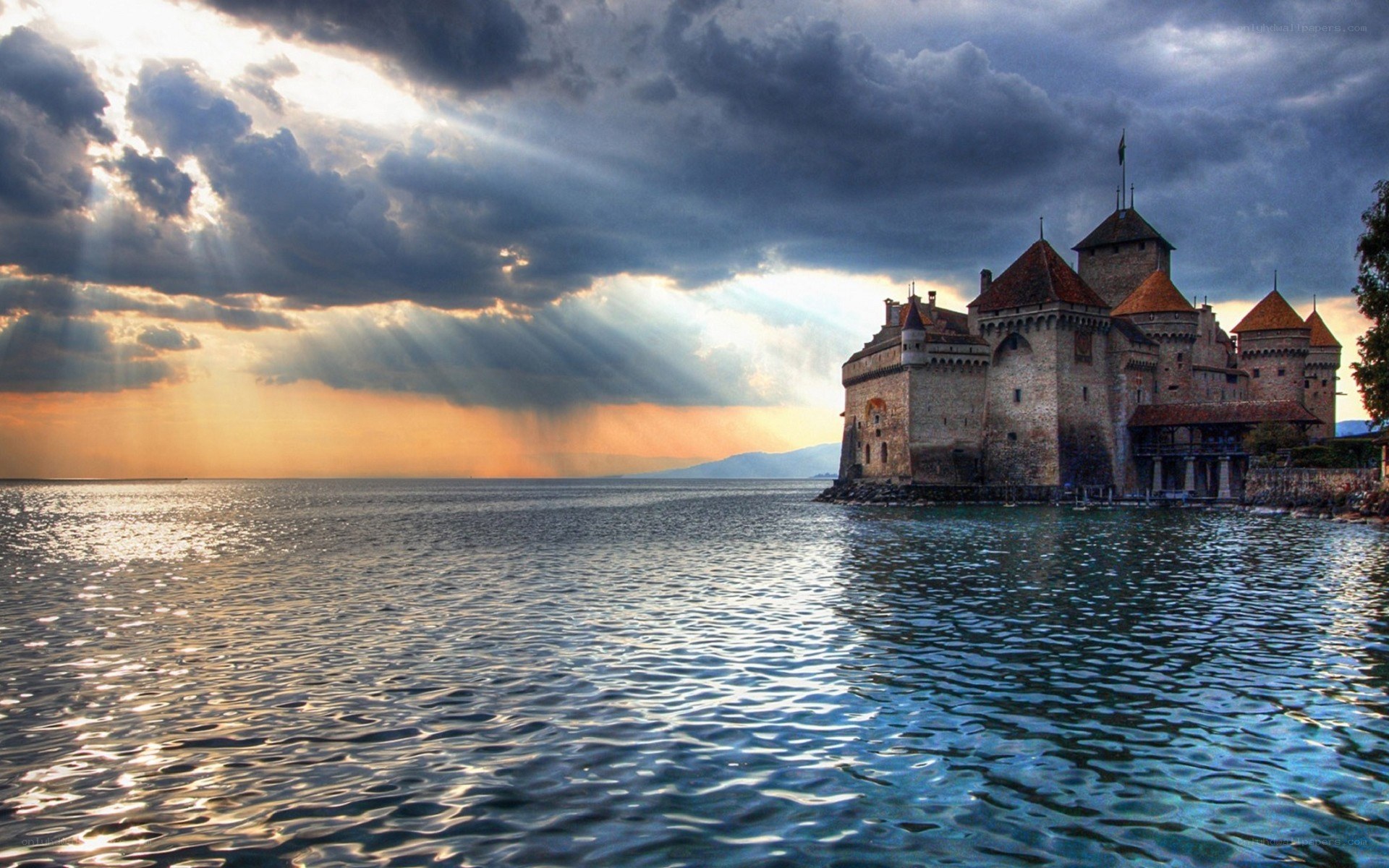 Castle on a lake at sunset