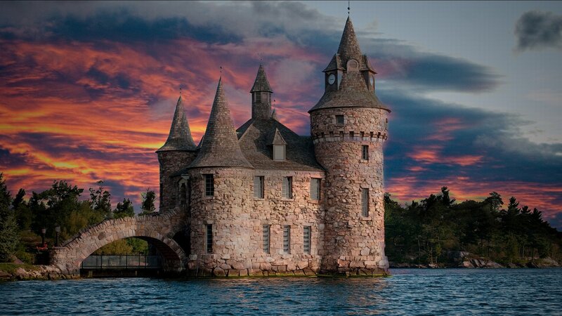 castle on a lake at sunset