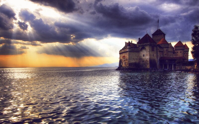 Castle on a lake at sunset