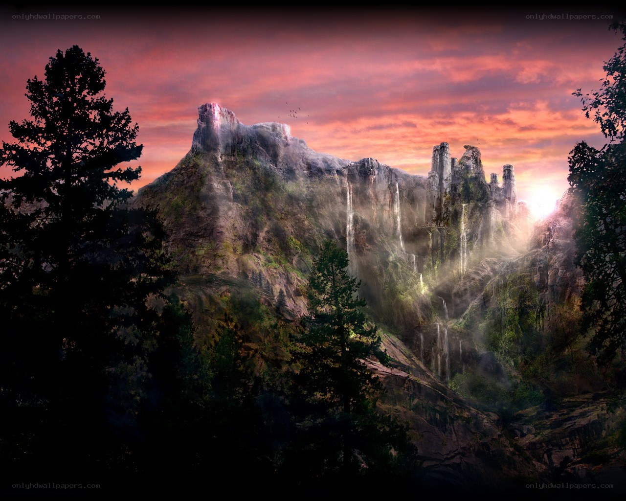 castle on a mountain at sunset