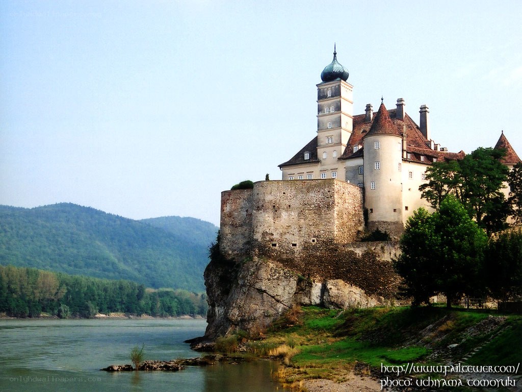 castle on a river cliff