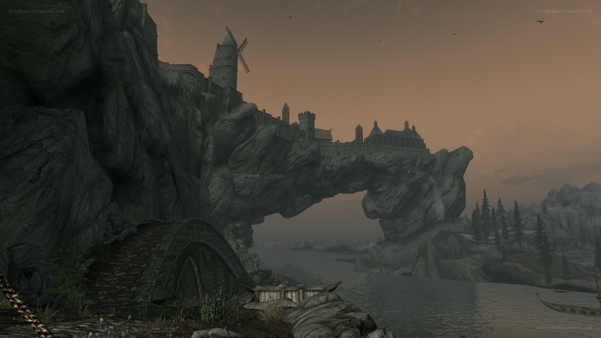 castle on a rock arch