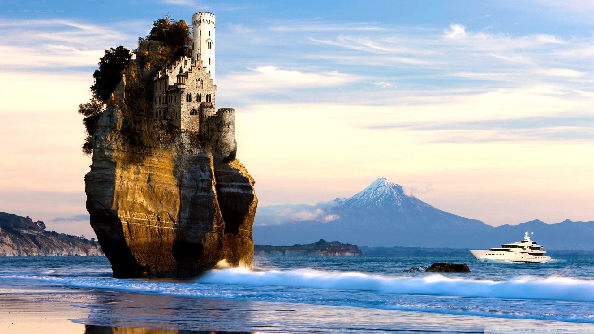 castle on a rock at sunset