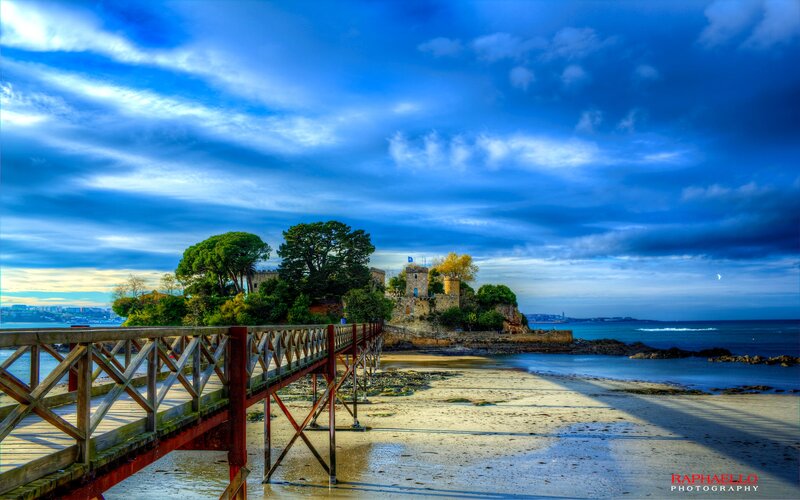 Castle on a Rocky Island — Blue, Dramatic