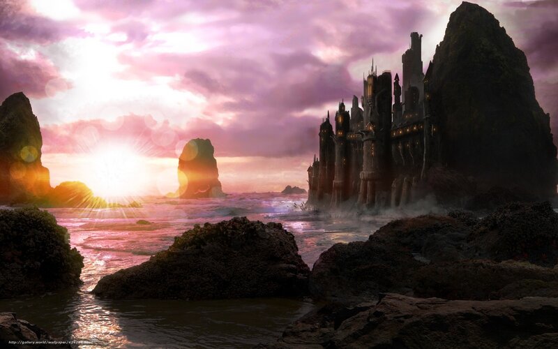 castle on a rocky shore at sunset