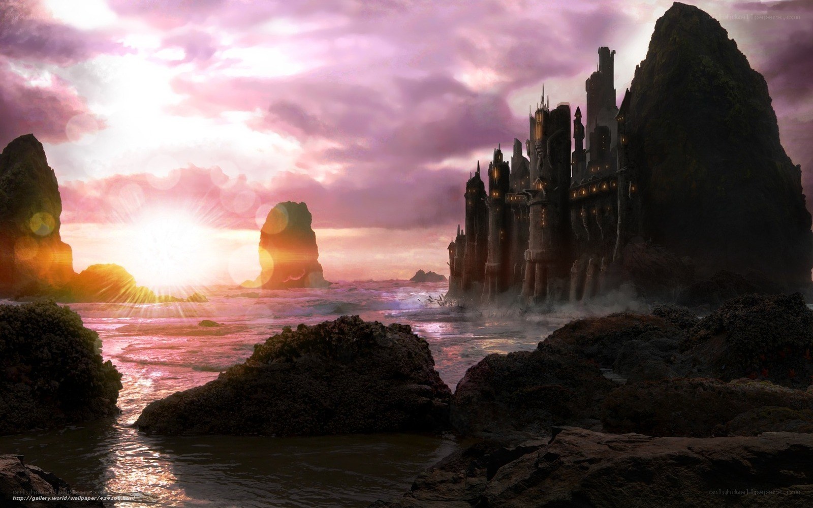 castle on a rocky shore at sunset