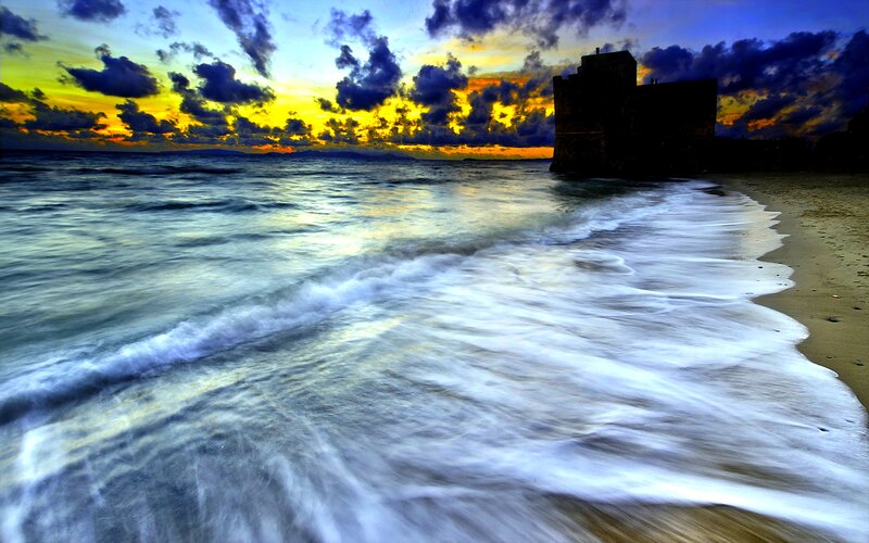 Castle on Beach at Sunset
