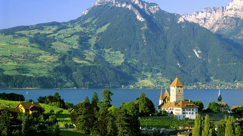 Castle on Lake Shore — Green, Serene, Afternoon, Photograph, Mountains
