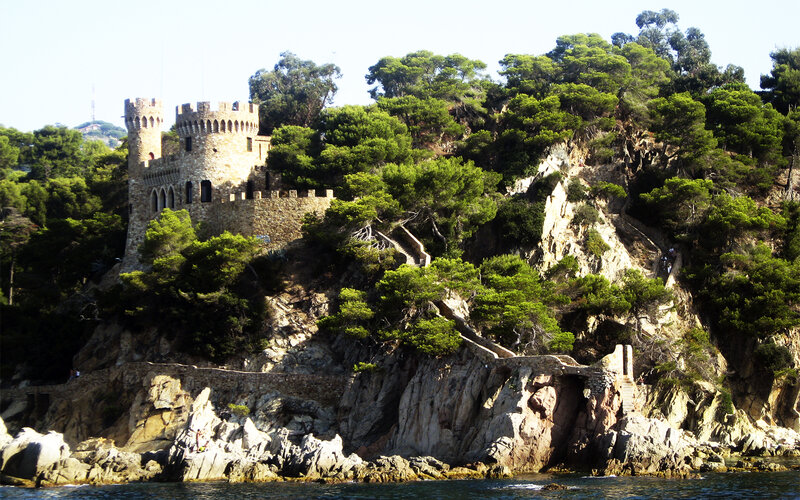 Castle on Rocky Cliff — Green, Serene, Afternoon, Photograph